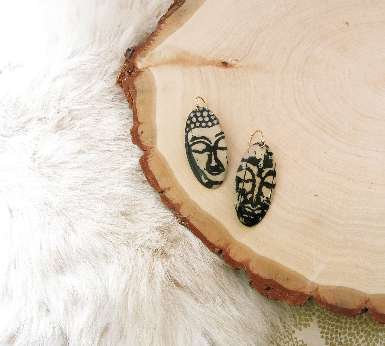 Buddha Faces Shield Dangles